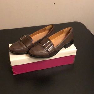 Naturalized brown flats with silver buckle